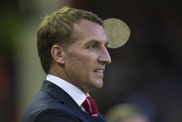Liverpool's manager Brendan Rodgers takes to the touchline before his team's English Premier League soccer match between Liverpool and Newcastle at Anfield Stadium, Liverpool, England, Monday, April 13, 2015. (AP Photo/Jon Super)