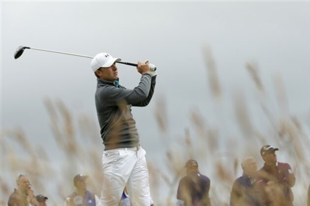 United States’ Jordan Spieth drives the ball from the 15th tee during the first round of the British Open Golf Championship at the Old Course, St. Andrews, Scotland, Thursday, July 16, 2015. (AP Photo/David J. Phillip)