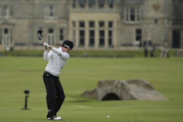 United States’ Zach Johnson drives the ball from the 18th tee during the first round of the British Open Golf Championship at the Old Course, St. Andrews, Scotland, Thursday, July 16, 2015. (AP Photo/David J. Phillip)