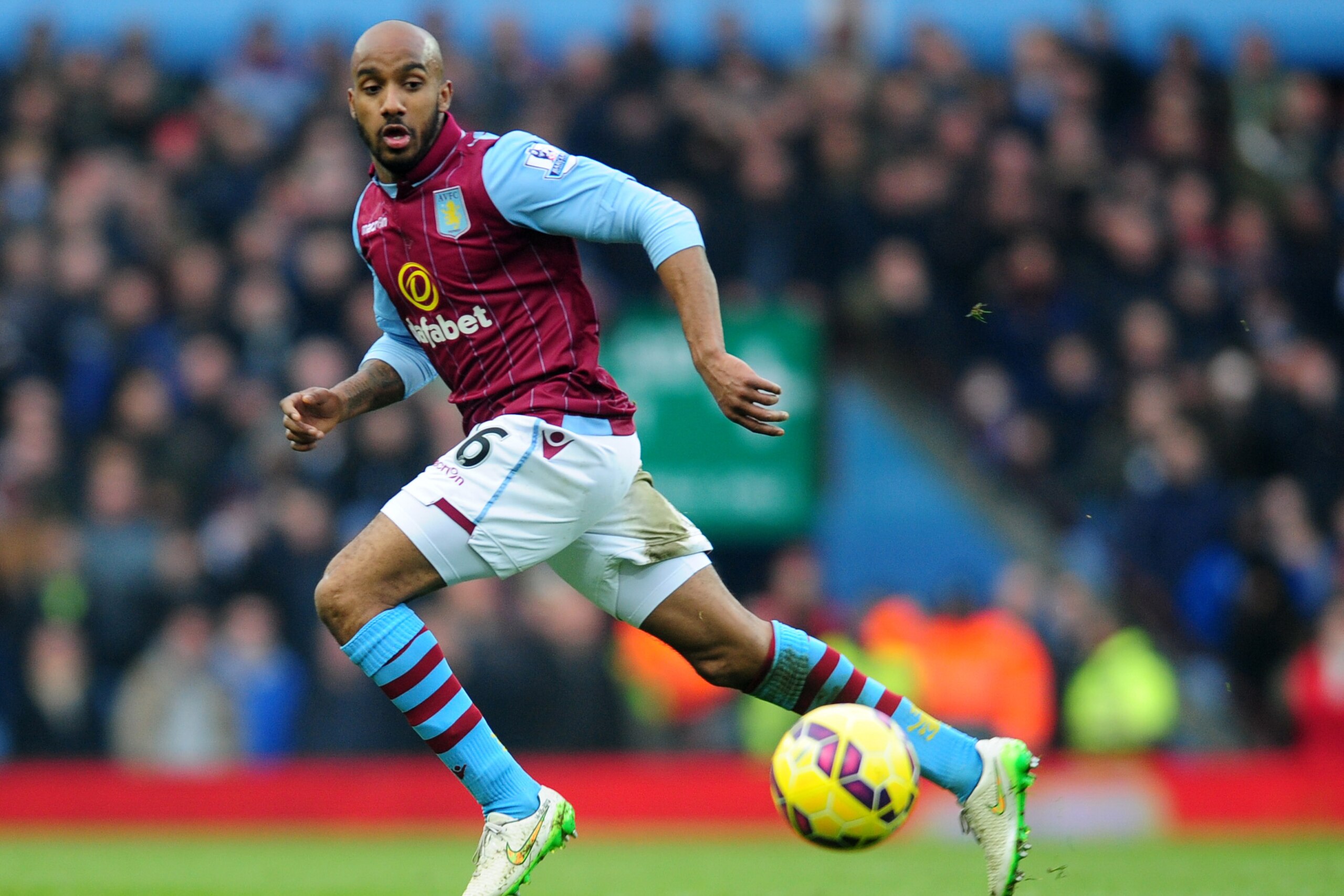 Villa's Fabian Delph follows the ball during the English Premier League soccer match between Aston Villa and Chelsea at Villa Park, Birmingham, England, Saturday, Feb 7, 2015. (AP Photo/Rui Vieira)
