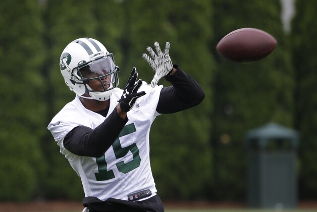 New York Jets' Brandon Marshall catches a pass during an NFL football organized team activity in Florham Park, N.J., Wednesday, May 27, 2015. (AP Photo/Seth Wenig)