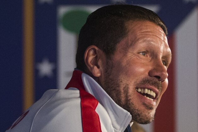 Atletico's coach Diego Simeone speaks during a press conference in Madrid, Spain, Monday, April 13, 2015.  Atletico Madrid will play Real Madrid Tuesday in a quarterfinal first leg Champions League soccer match. (AP Photo/Andres Kudacki).