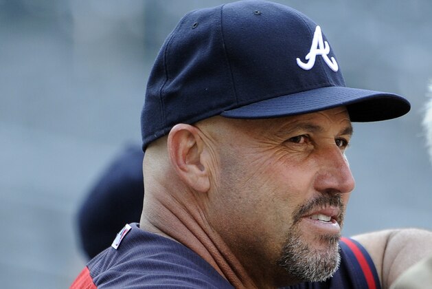 Atlanta Braves manager Fredi Gonzalez watches batting practice before a baseball game against the New York Mets at Citi Field on Thursday, Aug. 28, 2014, in New York. (AP Photo/Kathy Kmonicek)