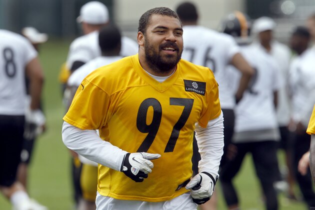 Pittsburgh Steelers defensive end Cameron Heyward (97) runs during NFL football minicamp, Thursday, June 18, 2015 in Pittsburgh. Heyward, who set a career-high last season with 7.5 sacks, is the longest tenured defensive end on the team following the retirement of Brett Keisel.(AP Photo/Keith Srakocic)