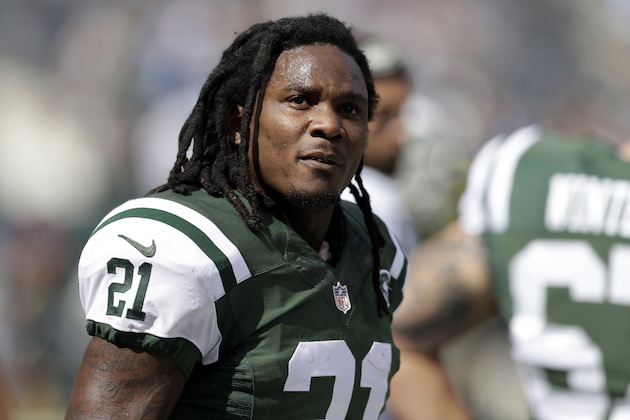 FILE - In this Sept. 28, 2014, file photo, New York Jets running back Chris Johnson warms up before an NFL football game against the Detroit Lions in East Rutherford, N.J. Johnson and another passenger were shot in their shoulders while stopped at a traffic light in Orlando early Sunday, March 8, 2015 and the driver of the vehicle they were in was killed. (AP Photo/Frank Franklin II, File)