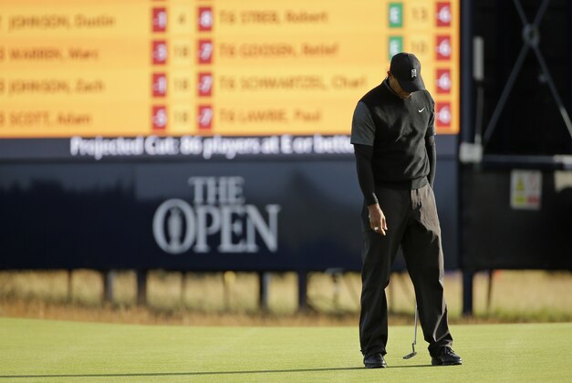 United States’ Tiger Woods reacts after a birdie putt attempt on the 4th hole during the second round of the British Open Golf Championship at the Old Course, St. Andrews, Scotland, Friday, July 17, 2015. (AP Photo/David J. Phillip)