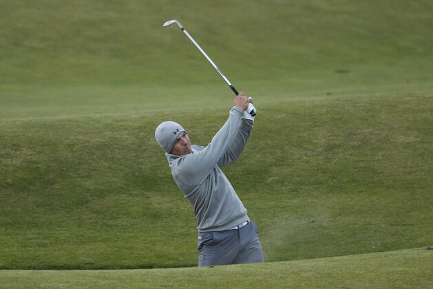 United States’ Jordan Spieth plays out of a bunker on the 12th hole during the second round of the British Open Golf Championship at the Old Course, St. Andrews, Scotland, Friday, July 17, 2015. (AP Photo/Jon Super)