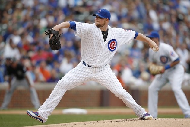 Chicago Cubs starting pitcher Jon Lester delivers against the Chicago White Sox during the first inning of a baseball game in Chicago, Saturday, July 11, 2015. (AP Photo/Andrew A. Nelles)