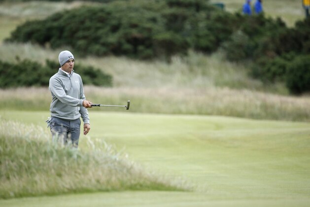 United States’ Jordan Spieth gestures as he plays on the 11th hole during the second round of the British Open Golf Championship at the Old Course, St. Andrews, Scotland, Friday, July 17, 2015. (AP Photo/Jon Super)