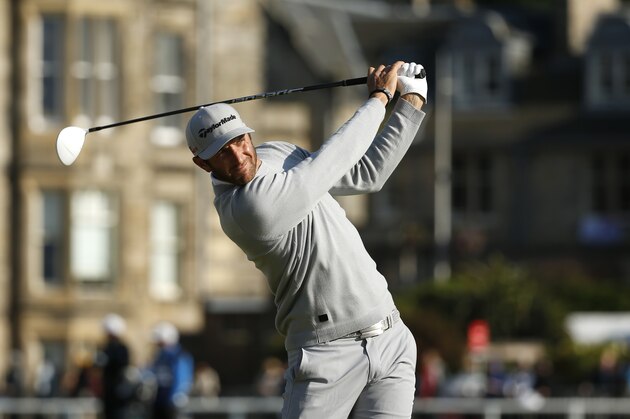 United States’ Dustin Johnson drives the ball from the 2nd tee during the second round of the British Open Golf Championship at the Old Course, St. Andrews, Scotland, Friday, July 17, 2015. (AP Photo/Jon Super)