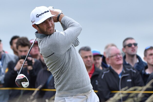Jul 16, 2015; St Andrews, GBR;  Dustin Johnson plays his tee shot on the 10th hole during The 144rd Open Championship - First Round at The Royal & Ancient Golf Club of St Andrews - Old Course. Mandatory Credit: Steve Flynn-USA TODAY Sports