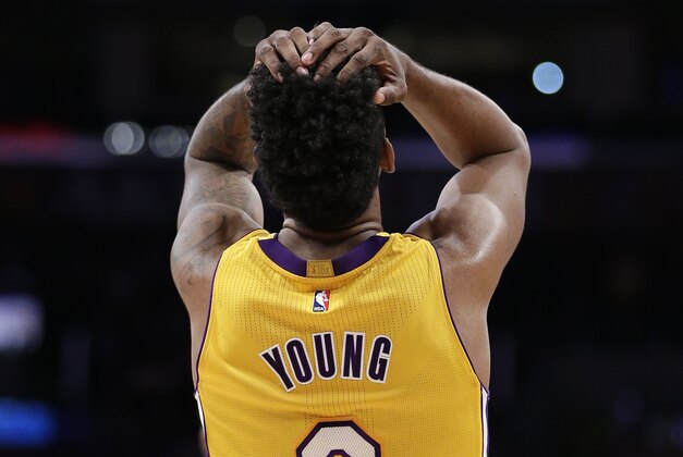 Los Angeles Lakers' Nick Young reacts to a foul call on teammate Carlos Boozer during the second half of an NBA basketball game against the Denver Nuggets on Tuesday, Feb. 10, 2015, in Los Angeles. The Nuggets won 106-96. (AP Photo/Jae C. Hong) Los Angeles Lakers' Nick Young reacts to a foul call on teammate Carlos Boozer during the second half of an NBA basketball game against the Denver Nuggets on Tuesday, Feb. 10, 2015, in Los Angeles. The Nuggets won 106-96. (AP Photo/Jae C. Hong)