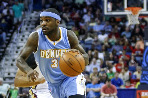 Denver Nuggets guard Ty Lawson (3) brings the ball up court against the New Orleans Pelicans in the first half of an NBA basketball game in New Orleans, Sunday, March 15, 2015. (AP Photo/Scott Threlkeld)
