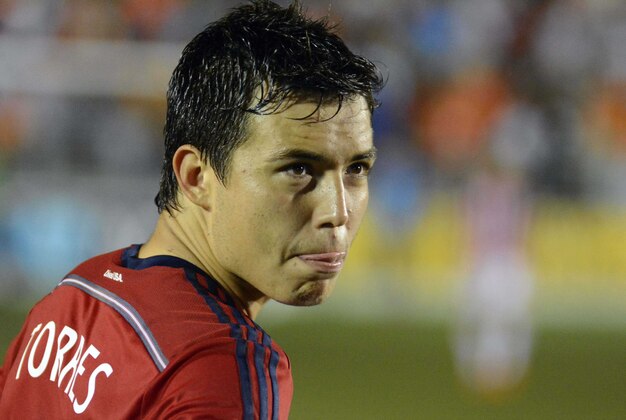 Jun 14, 2014; Cary, NC, USA; Chivas USA forward Erick Torres (9) reacts during overtime of the US Open Cup fourth round against the Carolina Railhawks at WakeMed Soccer Park.  The Carolina Railhawks advanced 1-1 (3-2 on penalties) Mandatory Credit: Rob Kinnan-USA TODAY Sports