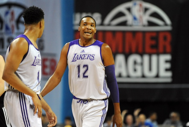 Jul 10, 2015; Las Vegas, NV, USA; Los Angeles Lakers center Robert Upshaw (12) reacts after a call during an NBA Summer League game against Minnesota at Thomas & Mack Center. Minnesota won the game 81-68.  Mandatory Credit: Stephen R. Sylvanie-USA TODAY Sports