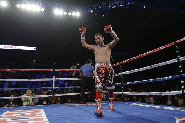 Nonito Donaire celebrates his win over Vic Darchinyan during round 9 of their featherweight rematch, Saturday, Nov. 9, 2013, in Corpus Christi, Texas. (AP Photo/Eric Gay) Nonito Donaire celebrates his win over Vic Darchinyan during round 9 of their featherweight rematch, Saturday, Nov. 9, 2013, in Corpus Christi, Texas. (AP Photo/Eric Gay)