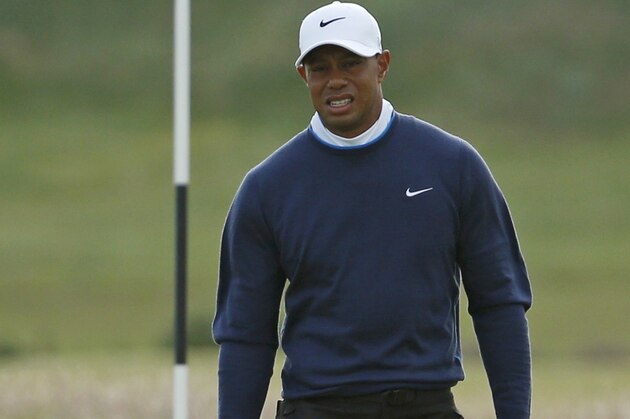United States’ Tiger Woods walks on the 13th green during the second round of the British Open Golf Championship at the Old Course, St. Andrews, Scotland, Saturday, July 18, 2015. (AP Photo/Jon Super)