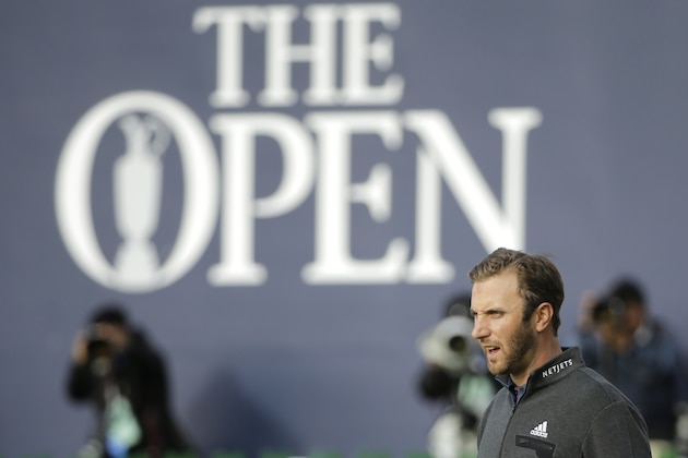 United States’ Dustin Johnson walks off the 18th green during the second round of the British Open Golf Championship at the Old Course, St. Andrews, Scotland, Saturday, July 18, 2015. (AP Photo/David J. Phillip)