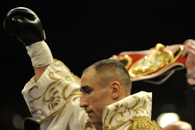 German boxer Arthur Abraham gestures before the IBF middleweight World Championship boxing fight in Kiel, northern Germany, on Saturday, March 14 , 2009. Abraham won the fight after twelve rounds.(AP Photo/Axel Heimken)