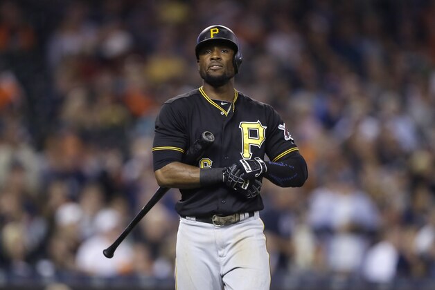 Pittsburgh Pirates' Starling Marte walks back to the dugout after striking out during the eighth inning of a baseball game against the Detroit Tigers, Tuesday, June 30, 2015, in Detroit. (AP Photo/Carlos Osorio)