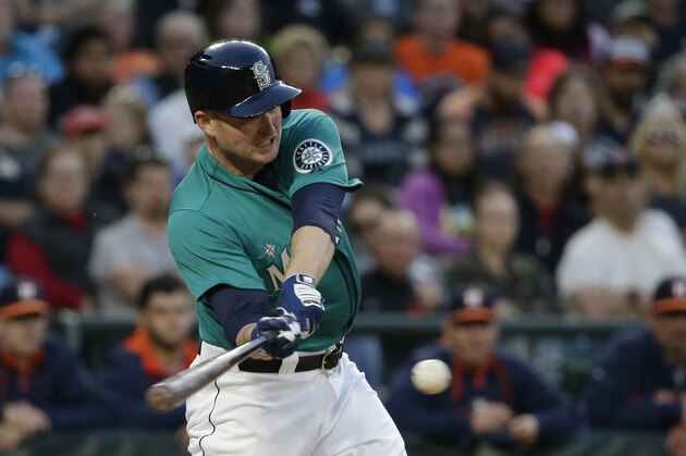 Seattle Mariners' Mark Trumbo in action in a baseball game Friday, June 19, 2015, in Seattle. (AP Photo/Elaine Thompson)