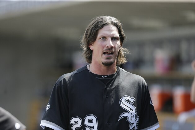 Chicago White Sox starting pitcher Jeff Samardzija walks in the dugout after being relieved during the eighth inning of a baseball game against the Detroit Tigers, Sunday, June 28, 2015, in Detroit. (AP Photo/Carlos Osorio)