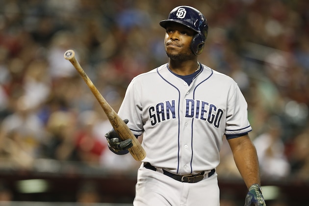 San Diego Padres left fielder Justin Upton (10) reacts after in the sixth inning during a baseball game against the Arizona Diamondbacks, Saturday, June 20, 2015, in Phoenix. (AP Photo/Rick Scstriking out uteri)