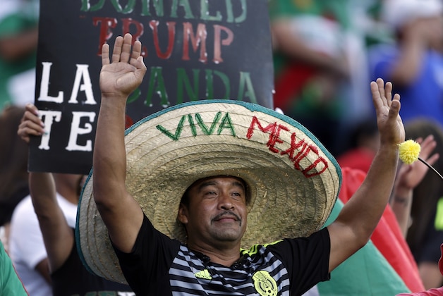A Mexico fan cheers during the first half of a CONCACAF Gold Cup soccer match in Charlotte, N.C., Wednesday, July 15, 2015. (AP Photo/Gerry Broome) A Mexico fan cheers during the first half of a CONCACAF Gold Cup soccer match in Charlotte, N.C., Wednesday, July 15, 2015. (AP Photo/Gerry Broome)