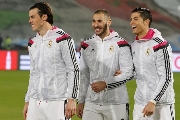 From left to right Real Madris's Gareth Bale, Karim Benzema and Cristiano Ronaldo share a laugh before the semi final soccer match between Real Madrid and Cruz Azul at the Club World Cup soccer tournament in Marrakech, Morocco, Tuesday, Dec. 16, 2014. (AP Photo/Abdeljalil Bounhar)