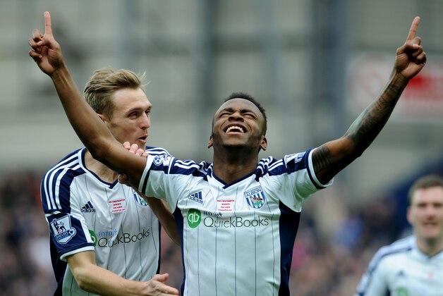 West Brom's Saido Berahino celebrates with Darren Fletcher, left, after scoring against Southampton during the English Premier League soccer match between West Bromwich Albion and Southampton at the Hawthorns, West Bromwich, England, Saturday, Feb. 28, 2015. (AP Photo/Rui Vieira)