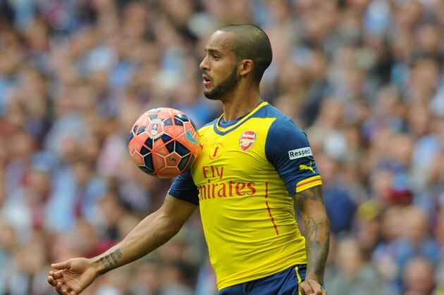 Arsenal's Theo Walcott during the English FA Cup final soccer match between Aston Villa and Arsenal at Wembley stadium in London, Saturday, May 30, 2015. Arsenal won the match 4-0. (AP Photo/Rui Vieira)