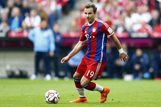Bayern's Mario Goetze controls the ball during the German first division Bundesliga soccer match between FC Bayern Munich and Hertha BSC at the Allianz Arena in Munich, Germany, on Saturday, April 25, 2015. (AP Photo/Matthias Schrader)