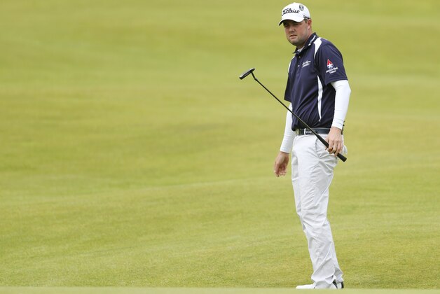 Australia’s Marc Leishman watches his putt on the 18th during the third round at the British Open Golf Championship at the Old Course, St. Andrews, Scotland, Sunday, July 19, 2015. (AP Photo/Peter Morrison)