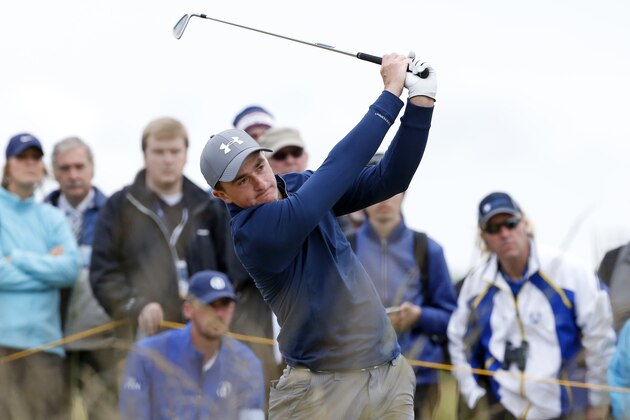 Ireland’s Paul Dunne plays from the tenth tee during the third round at the British Open Golf Championship at the Old Course, St. Andrews, Scotland, Sunday, July 19, 2015. (AP Photo/Jon Super)