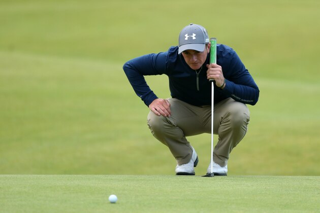 Ireland’s Paul Dunne lines up a putt on the 17th green during the second round of the British Open Golf Championship at the Old Course, St. Andrews, Scotland, Friday, July 17, 2015. (AP Photo/Peter Morrison) Ireland’s Paul Dunne lines up a putt on the 17th green during the second round of the British Open Golf Championship at the Old Course, St. Andrews, Scotland, Friday, July 17, 2015. (AP Photo/Peter Morrison)