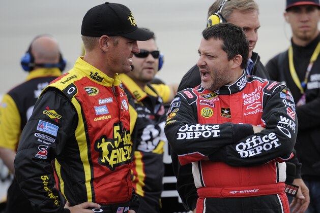Clint Bowyer, left, and Tony Stewart, right, talk together on pit road during qualifying for a NASCAR Sprint Cup Series auto race, Saturday, Sept. 29, 2012, at Dover International Speedway in Dover, Del. (AP Photo/Nick Wass) Clint Bowyer, left, and Tony Stewart, right, talk together on pit road during qualifying for a NASCAR Sprint Cup Series auto race, Saturday, Sept. 29, 2012, at Dover International Speedway in Dover, Del. (AP Photo/Nick Wass)