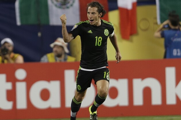 Mexico's Andres Guardado (18) reacts after scoring against Trinidad & Tobago during the second half of a CONCACAF Gold Cup soccer match in Charlotte, N.C., Wednesday, July 15, 2015. (AP Photo/Gerry Broome)