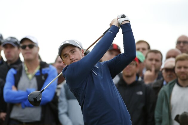 Ireland’s Paul Dunne plays from the 13th tee during the third round at the British Open Golf Championship at the Old Course, St. Andrews, Scotland, Sunday, July 19, 2015. (AP Photo/Jon Super)
