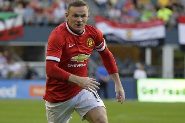 Manchester United captain Wayne Rooney runs during an international friendly soccer match against Club America, Friday, July 17, 2015, in Seattle. (AP Photo/Ted S. Warren)