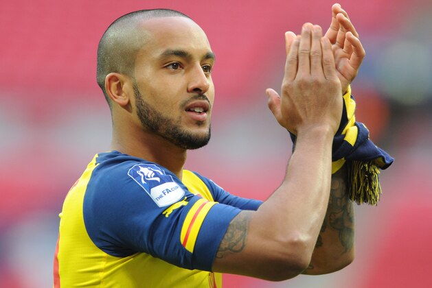 Arsenal's Theo Walcott after the English FA Cup final soccer match between Aston Villa and Arsenal at Wembley stadium in London, Saturday, May 30, 2015. Arsenal won the match 4-0. (AP Photo/Rui Vieira) Arsenal's Theo Walcott after the English FA Cup final soccer match between Aston Villa and Arsenal at Wembley stadium in London, Saturday, May 30, 2015. Arsenal won the match 4-0. (AP Photo/Rui Vieira)