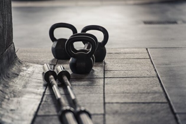 Barbell and kettlebell weights (Image Source via AP Images)
