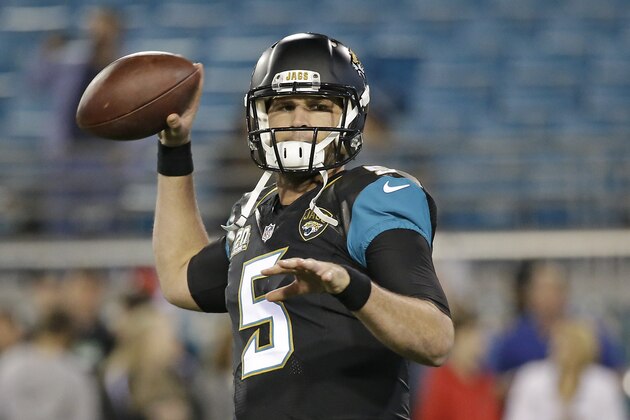 Jacksonville Jaguars quarterback Blake Bortles (5) throws a pass as he warms up before an NFL football game against the Tennessee Titans in Jacksonville, Fla., Thursday, Dec. 18, 2014. (AP Photo/John Raoux)