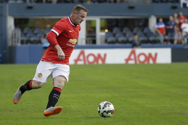 Manchester United's Wayne Rooney moves the ball against Club America during an international friendly soccer match, Friday, July 17, 2015, in Seattle. (AP Photo/Ted S. Warren) Manchester United's Wayne Rooney moves the ball against Club America during an international friendly soccer match, Friday, July 17, 2015, in Seattle. (AP Photo/Ted S. Warren)