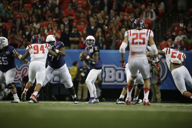 TCU quarterback Trevone Boykin (2) passes against Mississippi during the second half of the Peach Bowl NCAA football game, Wednesday, Dec. 31, 2014, in Atlanta. (AP Photo/David Goldman)