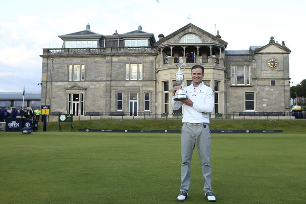 United States’ Zach Johnson poses with the trophy after winning a playoff after the final round at the British Open Golf Championship at the Old Course, St. Andrews, Scotland, Monday, July 20, 2015. (AP Photo/Peter Morrison) United States’ Zach Johnson poses with the trophy after winning a playoff after the final round at the British Open Golf Championship at the Old Course, St. Andrews, Scotland, Monday, July 20, 2015. (AP Photo/Peter Morrison)