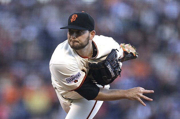 San Francisco Giants' Chris Heston works against the New York Mets in the first inning of a baseball game Monday, July 6, 2015, in San Francisco. (AP Photo/Ben Margot)
