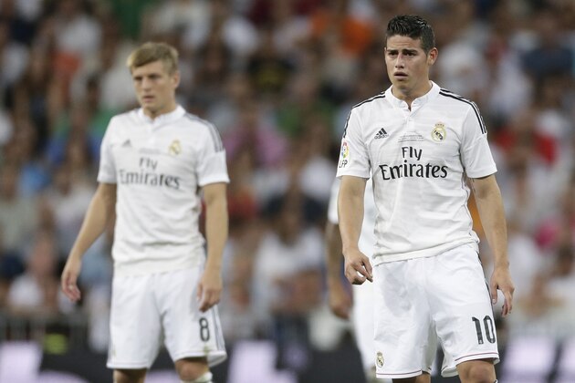 (L-R) Toni Kroos of Real Madrid, James Rodriguez of Real Madrid during the Spanisch Super Cup match between Real Madrid and Atletico Madrid at Estadio Santiago Bernabeu on august 19, 2014 in Madrid, Spain(Photo by VI Images via Getty Images)
