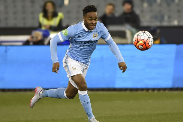 Raheem Sterling of Manchester City eyes the ball during the International Champions Cup football match between English Premier League team Manchester City and Italian side AS Roma in Melbourne on July 21, 2015. AFP PHOTO / Mal FAIRCLOUGH -- IMAGE RESTRICTED TO EDITORIAL USE - STRICTLY NO COMMERCIAL USE        (Photo credit should read MAL FAIRCLOUGH/AFP/Getty Images)
