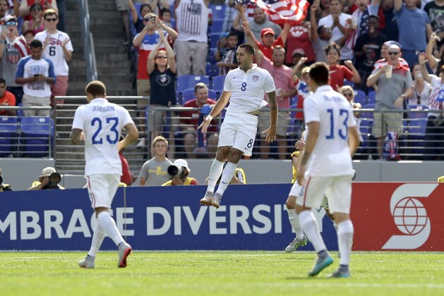 United States' Clint Dempsey (8) celebrates his goal against Cuba during the first half of a CONCACAF Gold Cup soccer quarterfinal match, Saturday, July 18, 2015, in Baltimore. (AP Photo/Patrick Semansky)