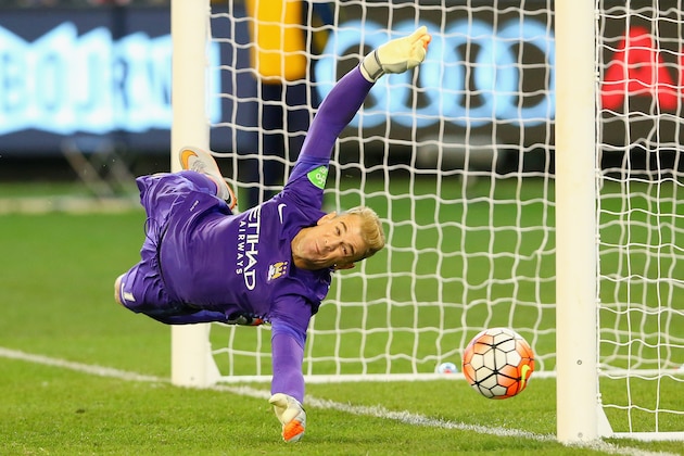 MELBOURNE, AUSTRALIA - JULY 21:  Manchester City goalkeeper Joe Hart attempts to make a save during the penalty shoot out at the end of the International Champions Cup friendly match between Manchester City and AS Roma at the Melbourne Cricket Ground on July 21, 2015 in Melbourne, Australia.  (Photo by Quinn Rooney/Getty Images)
